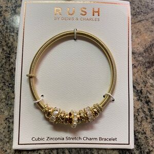 Gold charm bracelet
